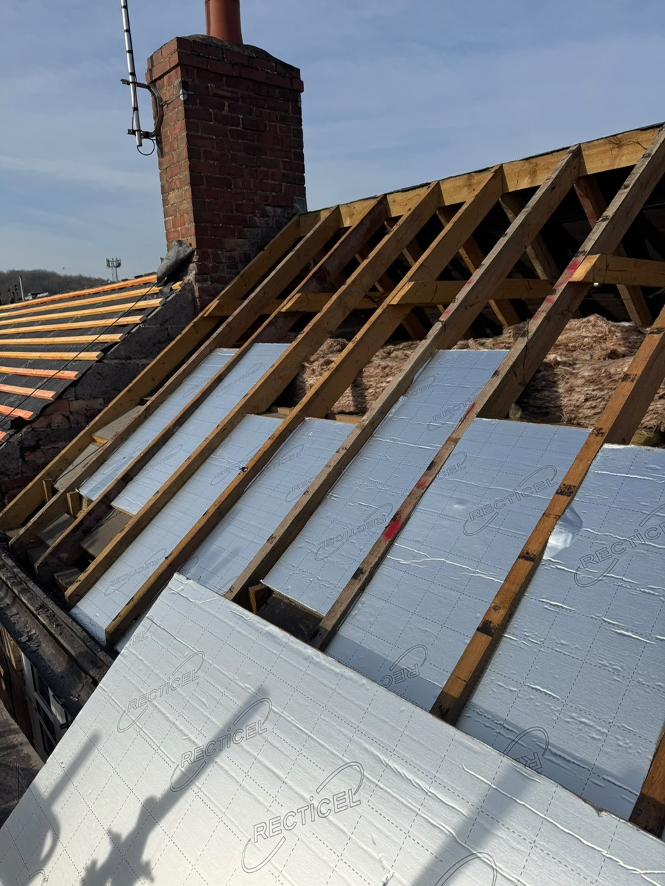 Roof insulation between rafters